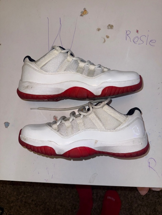 Jordan 11 low cherry bottom